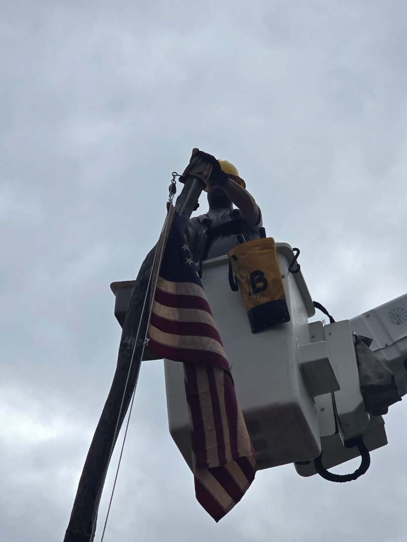 BC Line bucket truck flying the American flag
